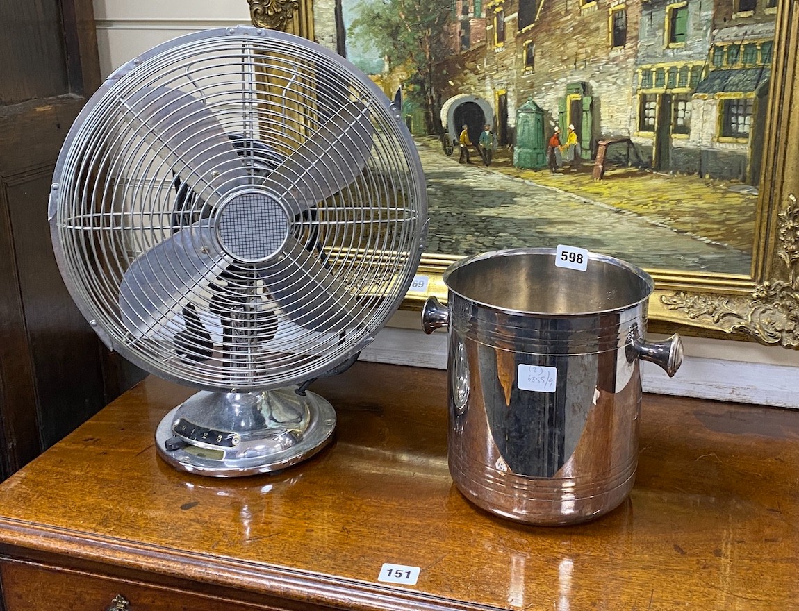 A modern propeller fan and a wine cooler